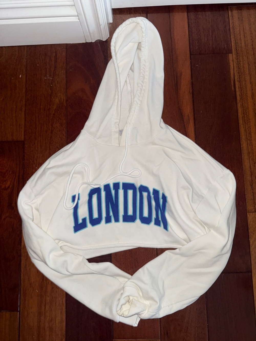 White Cropped Hoodie with Blue "LONDON" Graphic Adika